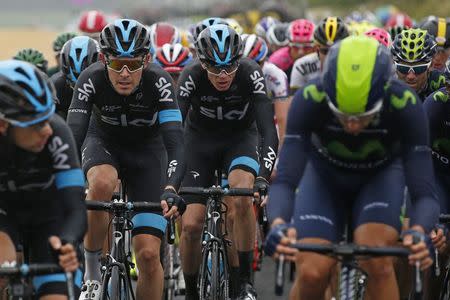 Team Sky riders Luke Rowe and Chris Froome of Britain cycle during the 189.5-km (117.7 miles) 5th stage of the 102nd Tour de France cycling race from Arras to Amiens, France, July 8, 2015. REUTERS/Benoit Tessier -