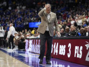 Kentucky head caoch John Calipari walks on the sideline in the final seconds of the Wildcats' loss to Texas A&M in an NCAA college basketball game at the Southeastern Conference tournament Friday, March 15, 2024, in Nashville, Tenn. (AP Photo/John Bazemore)