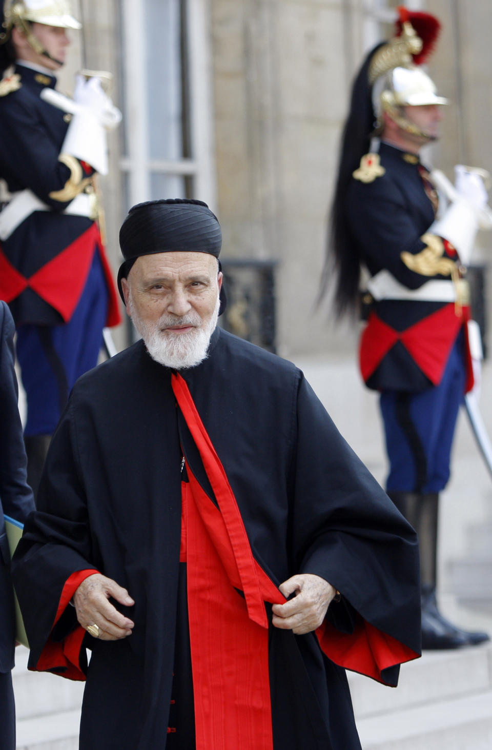 FILE - In this June 16, 2010 file photo, Cardinal Nasrallah Butros Sfeir, head of Lebanon's Maronite Church, arrives for a meeting with French President Nicolas Sarkozy at the Elysee Palace. Lebanon’s Maronite Christian church says its former patriarch Cardinal Nasrallah Butros Sfeir has died after days in hospital. He was 98.(AP Photo/Christophe Ena, File)