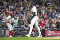 Milwaukee Brewers relief pitcher Devin Williams (38) celebrates after striking out Philadelphia Phillies' Trea Turner during the ninth inning of a baseball game Saturday, Sept. 2, 2023, in Milwaukee. (AP Photo/Kayla Wolf)