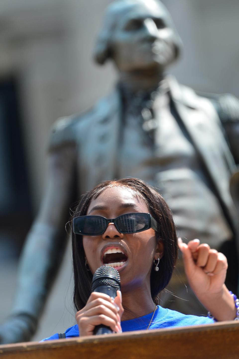 A rally protesting the planned firing squad execution of Richard Moore of Spartanburg took place at the South Carolina State House in Columbia on April 23, 2022.  Spartanburg native Courtney McClain, a junior at USC, spoke about the need for young people to come out and have their voices heard in South Carolina. 