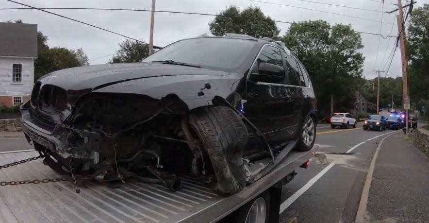 Police say this BMW was involved in a carjacking in Boston on Saturday, Sept. 23, 2023. It crashed in Kingston after a police pursuit and the driver, a Scituate man, was arrested.