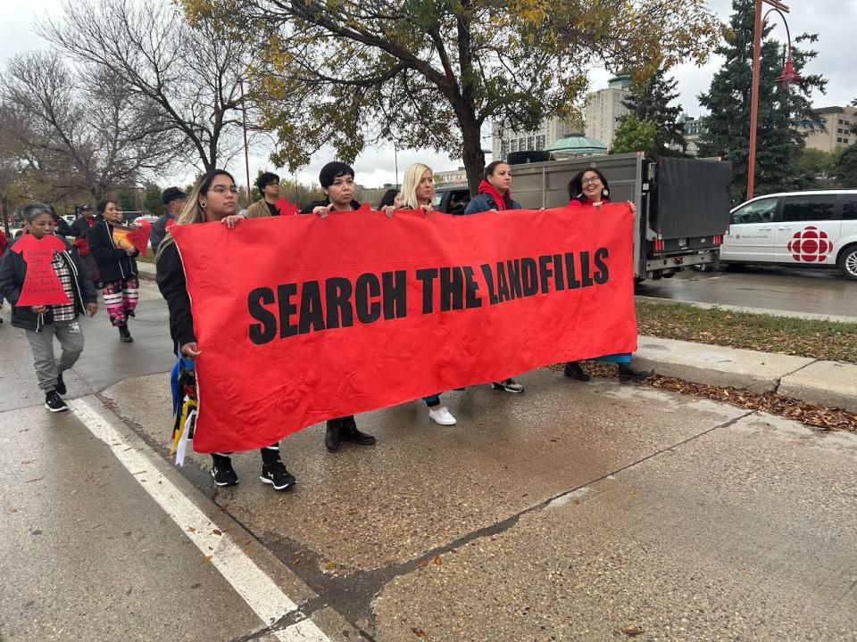 About two dozen people marched from the Canadian Museum for Human Rights to the Legislative Building in Winnipeg on Wednesday. The march was organized by the Assembly of Manitoba Chiefs' First Nations family advocate.