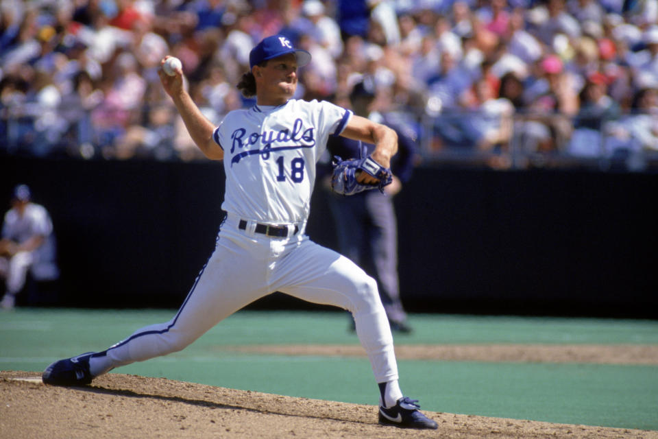 KANSAS CITY, MO - 1990:  Bret Saberhagen #31 of the Kansas City Royals winds up for a pitch during a game in 1990 at Royals Stadium in Kansas City, Missouri.  (Photo by Jonathan Daniel/Getty Images)