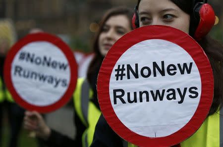 Demonstrators protest on Abbingdon Green before the government's announcement on airport expansion, in London, Britain October 25, 2016. REUTERS/Peter Nicholls