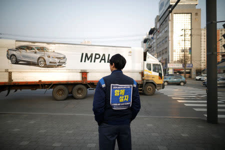 Hwang Ho-in, a forklift truck driver at GM Korea's Bupyeong plant, stands outside the plant in Incheon, South Korea March 12, 2018. REUTERS/Kim Hong-Ji