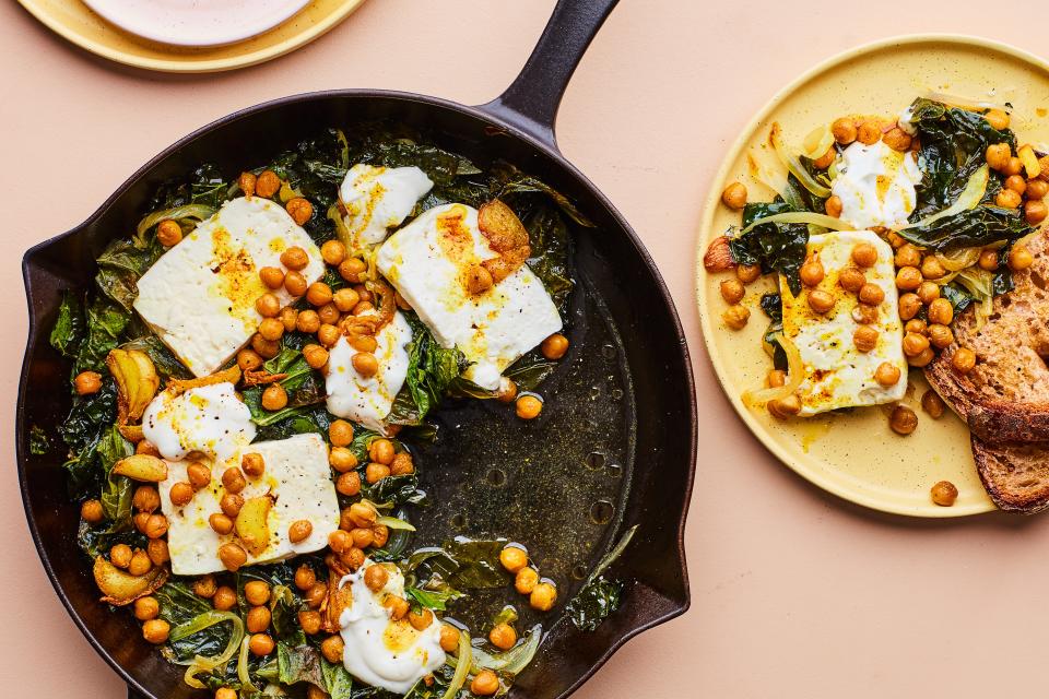 Vegetarian mains don’t have to take an hour to prepare. Warm feta, crispy chickpeas, and wilted hearty greens become a fork-and-knife entrée in about 30 minutes. <a rel="nofollow noopener" href="https://www.epicurious.com/recipes/food/views/baked-feta-and-greens-with-lemony-yogurt?mbid=synd_yahoo_rss" target="_blank" data-ylk="slk:See recipe.;elm:context_link;itc:0;sec:content-canvas" class="link ">See recipe.</a>