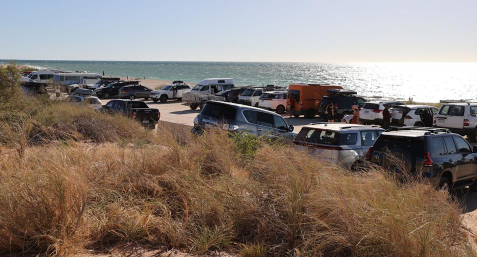 Cars and caravans at a beach in Exmouth, in WA. 