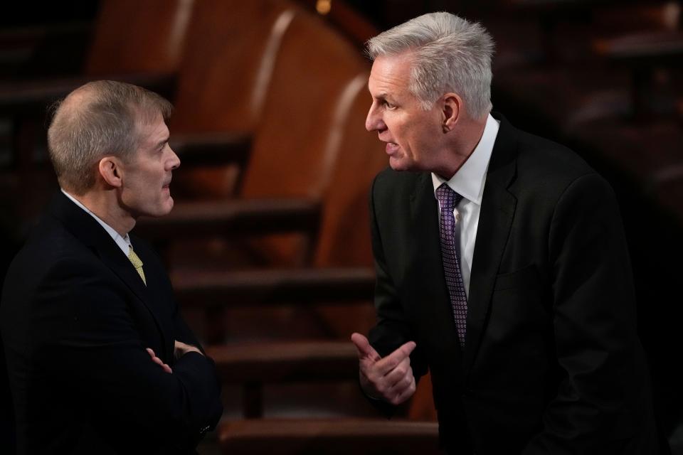 Rep. Jim Jordan, R-Ohio, talks with Rep. Kevin McCarthy, R-Calif., in the House chamber earlier this month. McCarthy was later elected House speaker.