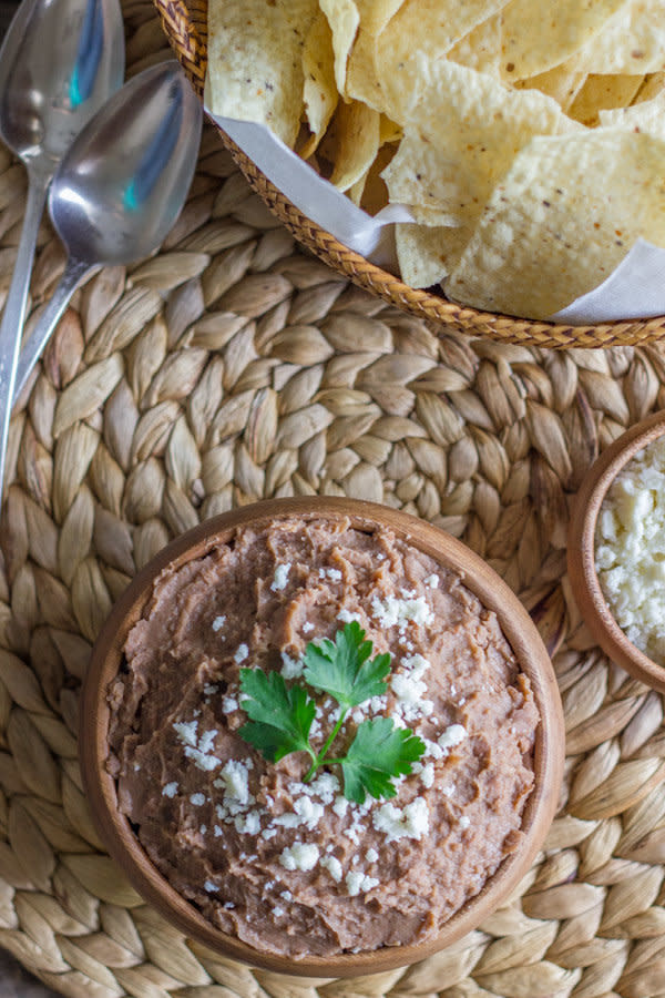 <strong>Get the <a href="https://lovelylittlekitchen.com/healthy-crockpot-refried-beans/" target="_blank">Healthy Crockpot Refried Beans recipe</a>&nbsp;from&nbsp;Lovely Little Kitchen</strong>