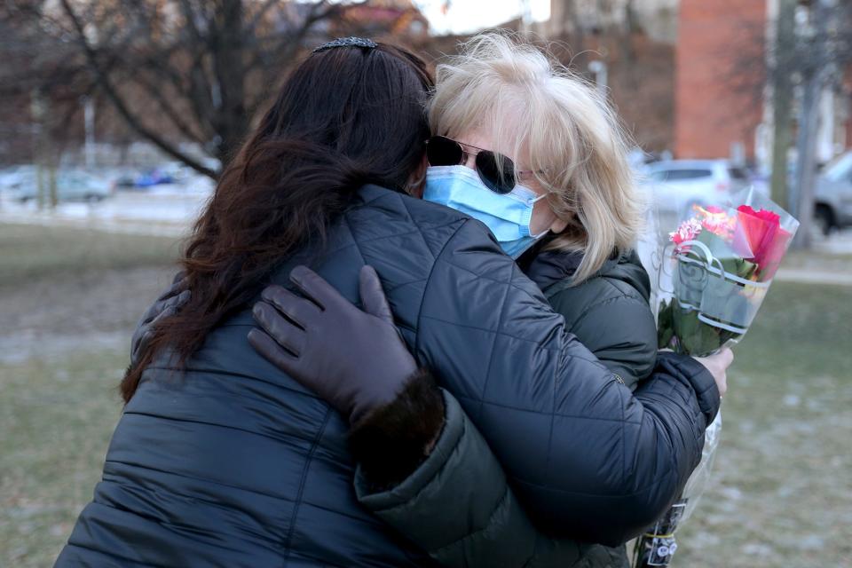 Michelle Cook, left, gives a hug to Lori Brown of Dover Thursday, Jan. 20, 2022. Brown is credited with saving the life of Gisele Tibbets, who Cook's mother, Sunday afternoon in Dover.