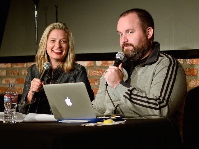 <p>Michael Schwartz/WireImage</p> Tom Segura and his wife Christina Pazsitzky doing the "Your Mom's House" podcast at The Ice House Comedy Club on Feb. 14, 2015.