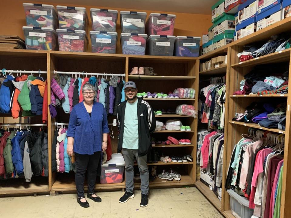 The Rev. Melodye VanOudheusden and Jason Aaron are pictured inside the Eagles Outfitters at Arborwood Elementary School in Monroe. The pair helped to create the Outfitters store in 2021.