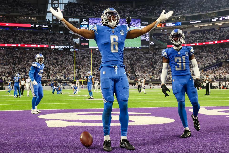 Lions safety Ifeatu Melifonwu celebrates after he intercepted a pass against the Vikings late in the fourth quarter of the Lions' 30-24 win to clinch the NFC North.