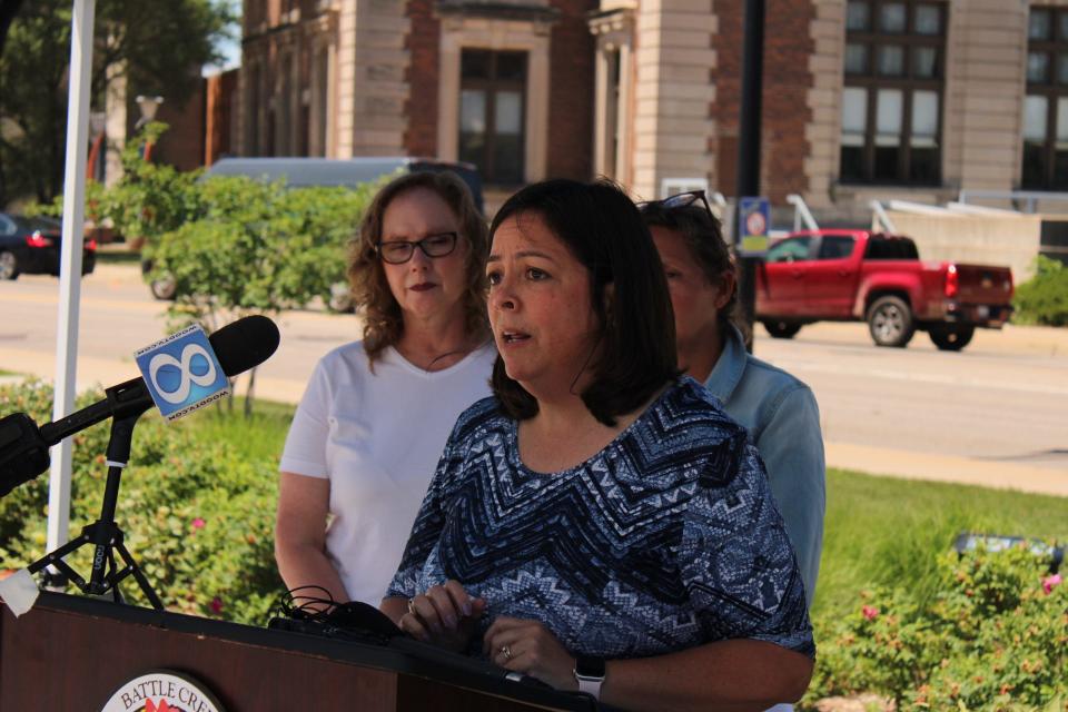 Battle Creek City Manager Rebecca Fleury speaks about Kellogg Company's upcoming transformation Wednesday, June 22, outside City Hall.