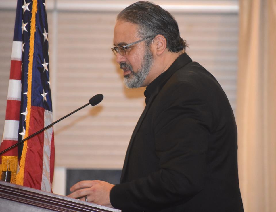 Lifelong Adrian resident and community activist Ben Negron addresses the audience inside Adrian College's Tobias Center Monday, Jan. 16, 2023, after being awarded the 2023 Community Service Award during the Martin Luther King Jr. Community Celebration and Dinner.