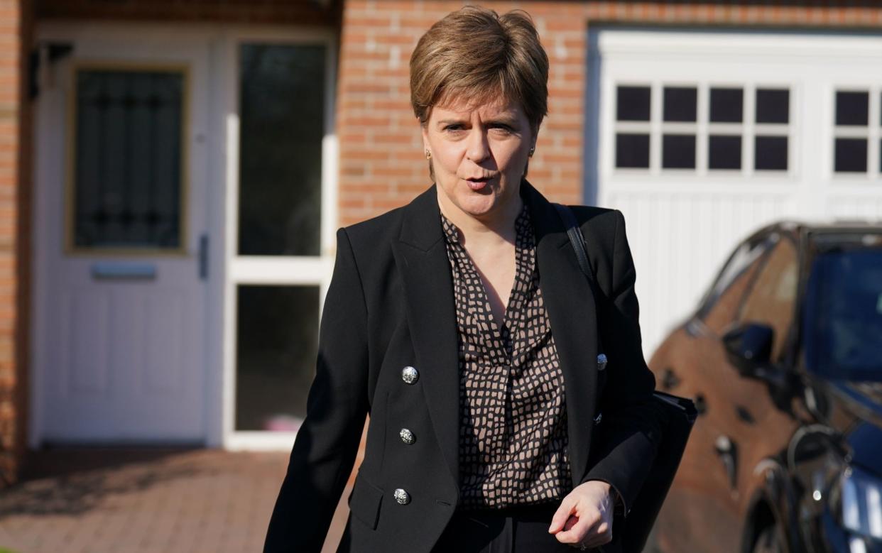 Ms Sturgeon, leaving her home in Glasgow, has vigorously denied any wrongdoing