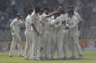 New Zealand's Ajaz Patel celebrates the dismissal of India's Mohammed Siraj during the day two of their second test cricket match with India in Mumbai, India, Saturday, Dec. 4, 2021.(AP Photo/Rafiq Maqbool)