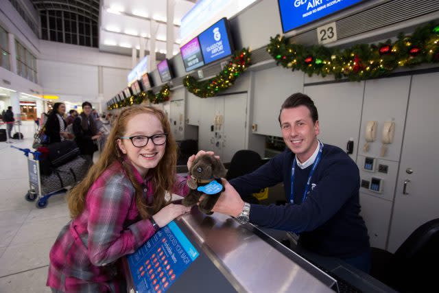 Eve Mcilquham with airport ambassador Brian Thomson