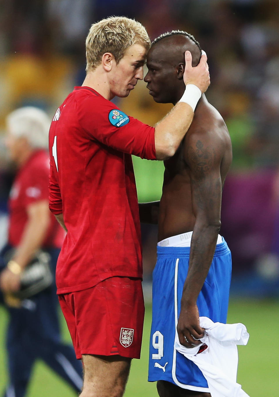 KIEV, UKRAINE - JUNE 24: Joe Hart of England is consoled by Mario Balotelli of Italy after defeat in the penalty shoot out during the UEFA EURO 2012 quarter final match between England and Italy at The Olympic Stadium on June 24, 2012 in Kiev, Ukraine. (Photo by Scott Heavey/Getty Images)