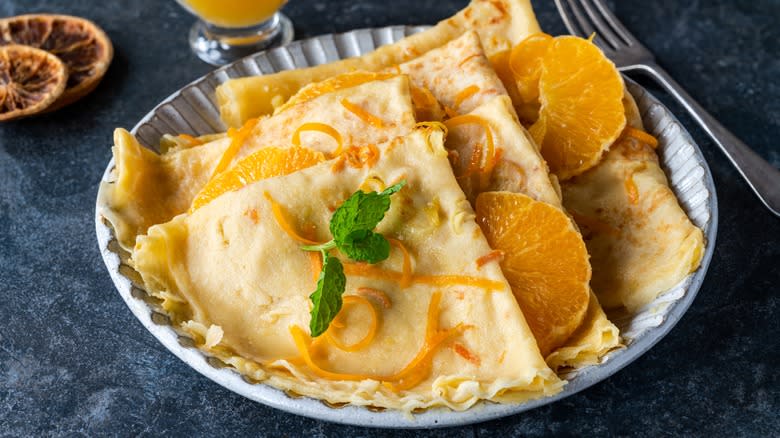 Crêpes Suzette with oranges, garnish