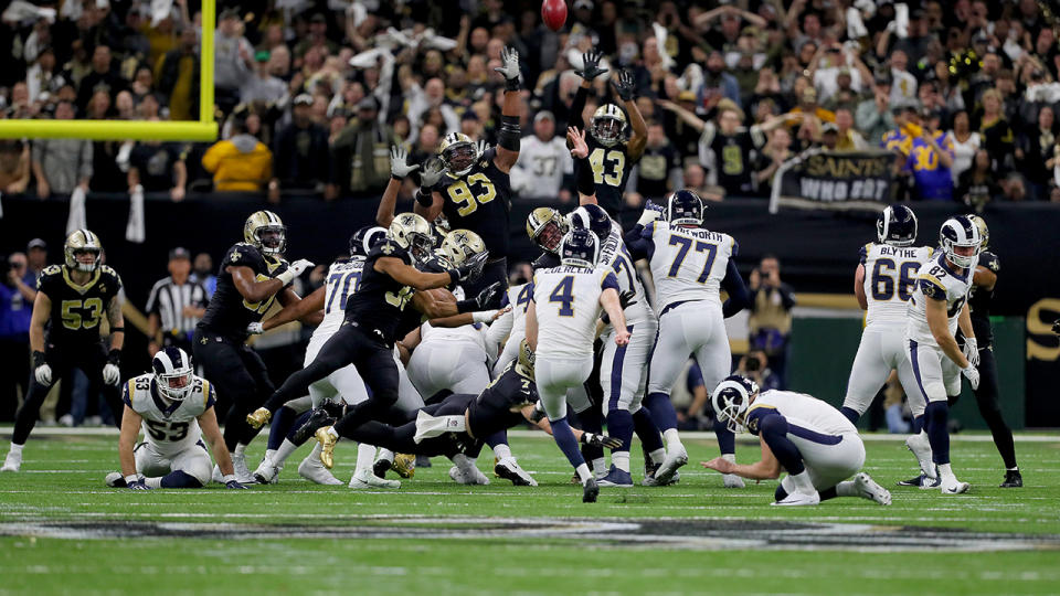 Greg Zuerlein kicks a field goal to tie the game and send it to overtime. (Photo by Sean Gardner/Getty Images)