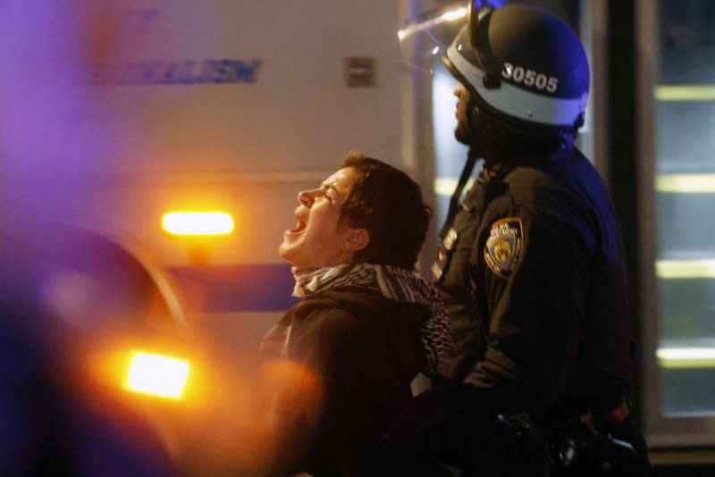 NYPD police officers arrest a Pro-Palestine protester who occupied Hamilton Hall at Columbia University in New York City. Pro-Palestine student demonstrators occupied the building overnight and refused to vacate the premises. Pro-Palestinian protests have continued for nearly two weeks on the school's campus. Photo by John Angelillo/UPI