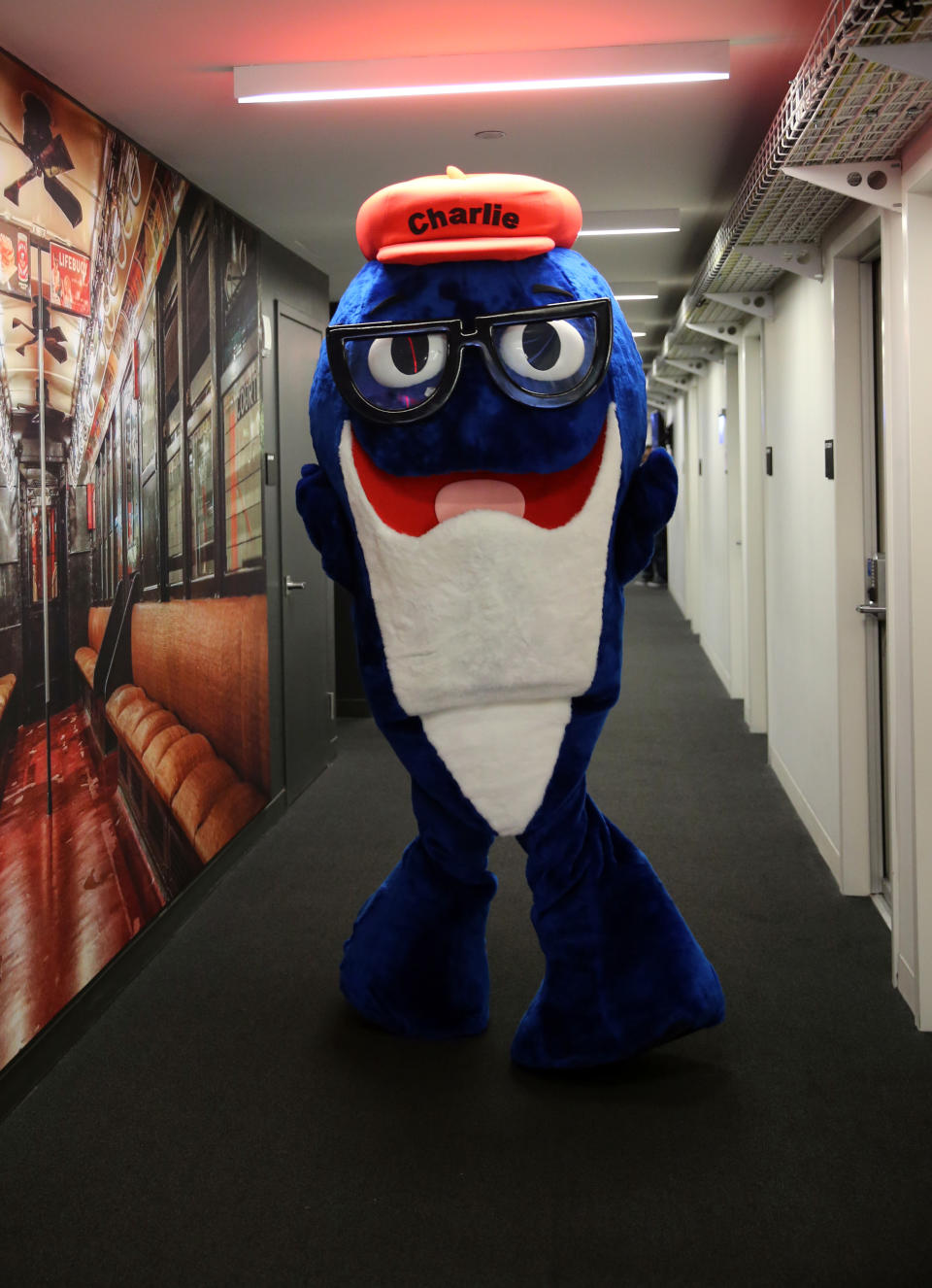 <p>Charlie the Tuna from StarKist swims the halls along with a group of company mascots brought in as interns for the day at Yahoo Studios in New York City on Sept. 25, 2017. (Photo: Gordon Donovan/Yahoo News) </p>