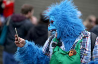 <p>A carnival reveller takes a selfie as he celebrates the start of the hot season on Women’s Carnival, February 23, 2017, in Cologne, western Germany. (Photo: Ina Fassbender/AFP/Getty Images) </p>