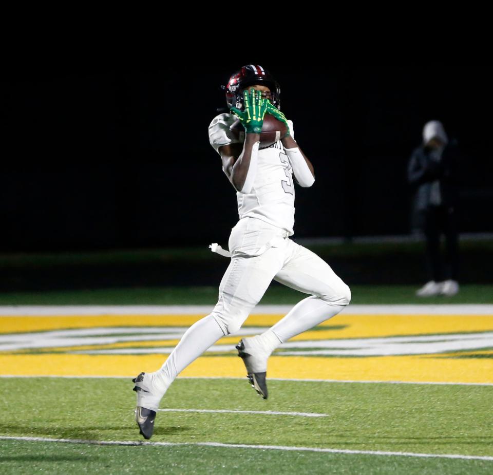 NorthWood senior NiTareon Tuggle catches a touchdown pass in the second quarter of the IHSAA Class 4A, Sectional 18 football championship game Friday, Nov. 3, 2023, at Northridge High School in Middlebury.
