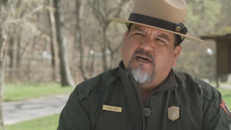 PHOTO: National Park Service Director Chuck Sams talks with ABC News Medical Correspondent Dr. Darien Sutton about the ParkRx program in Rock Creek National Park in Washington, D.C. (Paul Dougherty/ABC News)