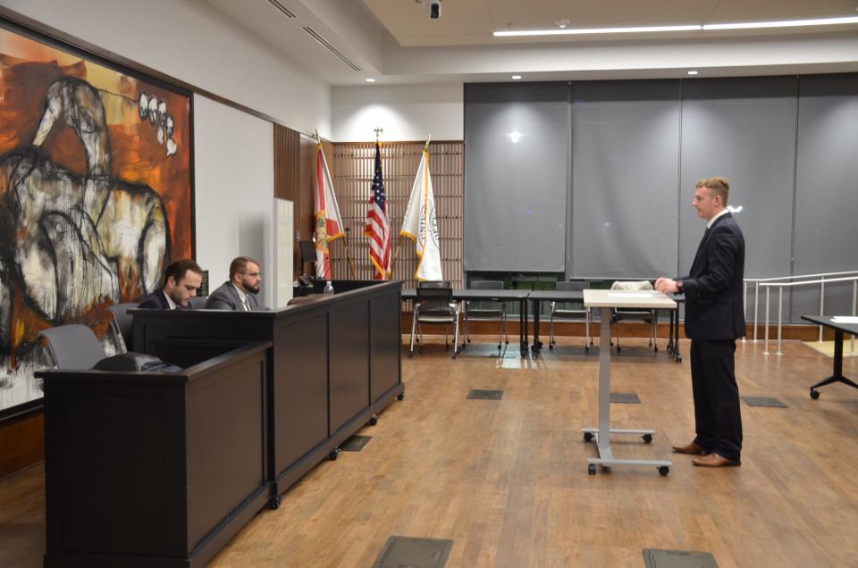 Colin Snyder, of Stetson University's moot court team, presents an argument to judges at a regional competition. The team is headed to the American Moot Court Association National Tournament in Baton Rouge, Louisiana, on Jan. 14 and 15.