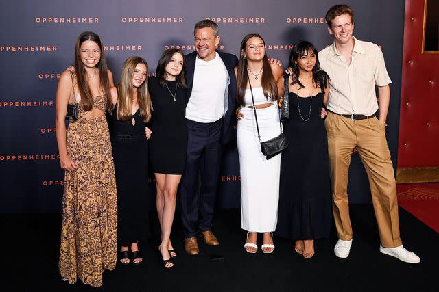 <p>JULIEN DE ROSA/AFP via Getty</p> Matt Damon with his daughters at the premiere of 'Oppenheimer.'