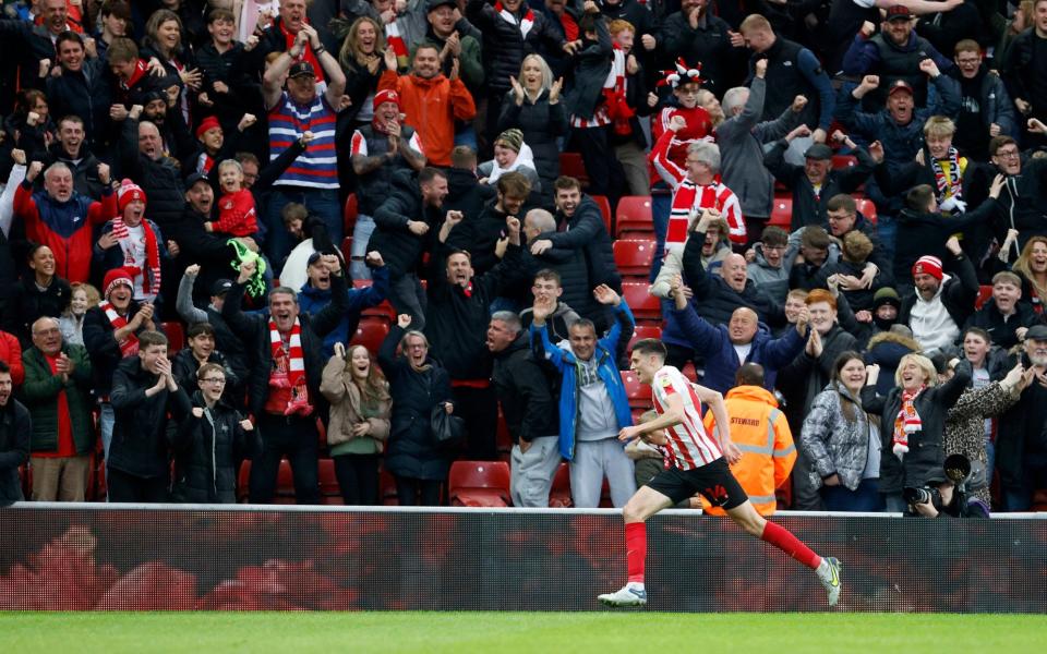 Sunderland's Ross Stewart celebrates his opening goal in front of the fans - PA