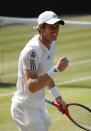 Great Britain's Andy Murray celebrates a point against Serbia's Novak Djokovic in their Men's Final during day thirteen of the Wimbledon Championships at The All England Lawn Tennis and Croquet Club, Wimbledon.