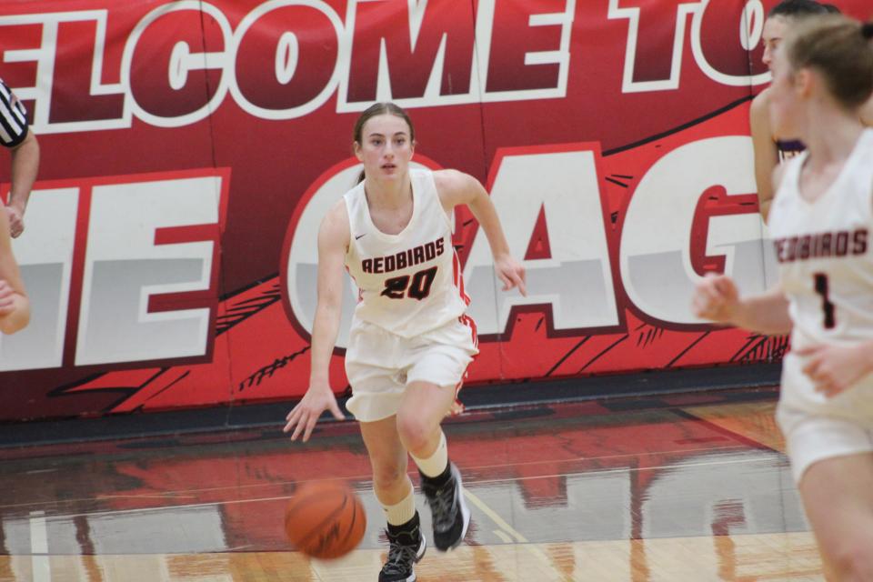 Loudonville's Sophia Spangler keeping her eyes up the court looking for a teammate.