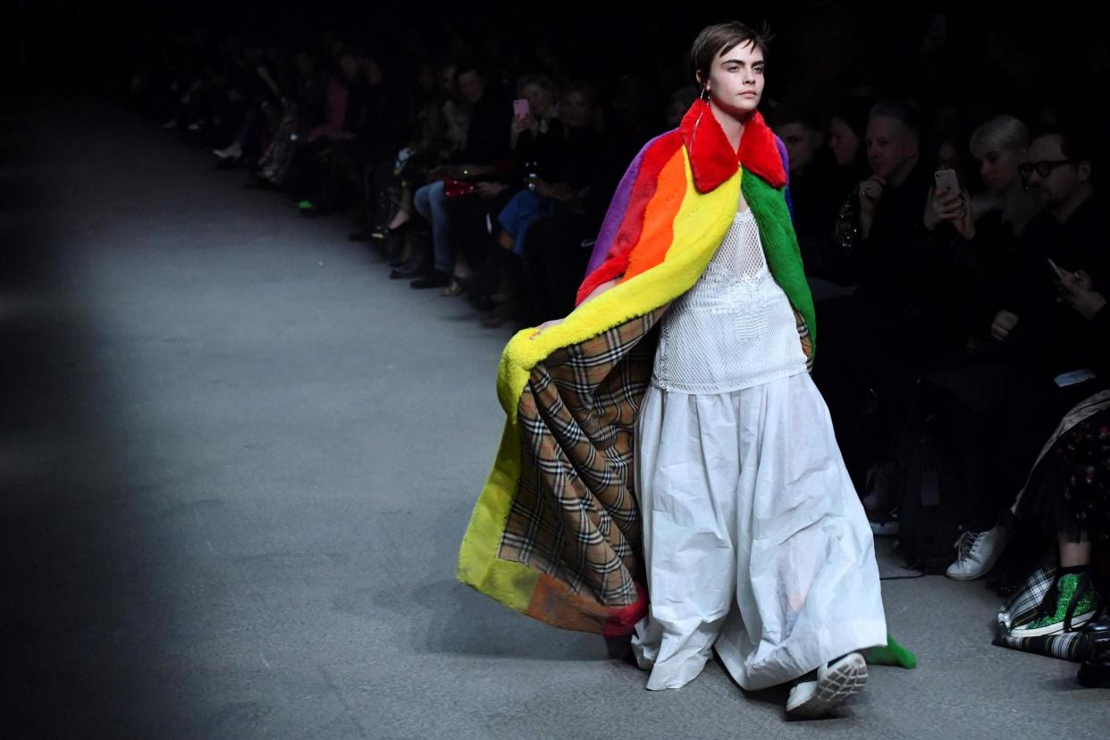 Cara Delevingne wearing a Pride-inspired creation at the Burberry show at London Fashion Week: AFP/Getty Images