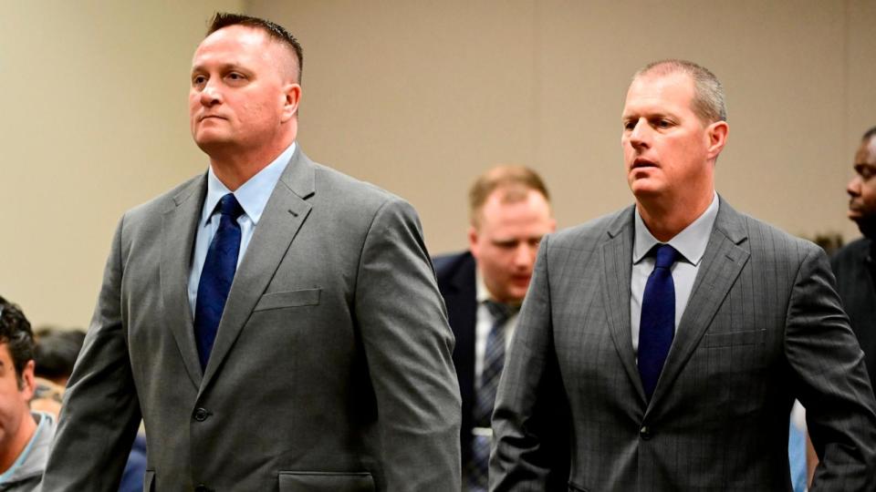 PHOTO: Paramedics Jeremy Cooper, left, and Peter Cichuniec, right, at an arraignment in the Adams County district court at the Adams County Justice Center Jan. 20, 2023. (Andy Cross/MediaNews Group/The Denver Post via Getty Images, FILE)
