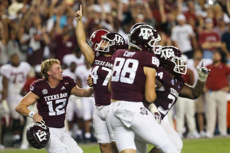 Texas A&M kicker Seth Small (47) celebrates after kicking a 28 yard game game winning field goal against Alabama in the fourth quarter at Kyle Field.