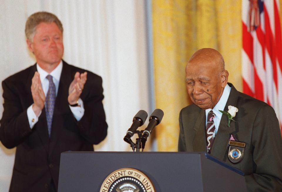 Then 94-year-old Herman Shaw speaks at a 1997 White House ceremony about the abuse he received during the Tuskegee syphilis study. <a href="https://www.gettyimages.com/detail/news-photo/ninety-four-year-old-herman-shaw-speaks-as-us-president-news-photo/51654525?adppopup=true" rel="nofollow noopener" target="_blank" data-ylk="slk:Paul J. Richards/AFP via Getty Images;elm:context_link;itc:0;sec:content-canvas" class="link ">Paul J. Richards/AFP via Getty Images</a>