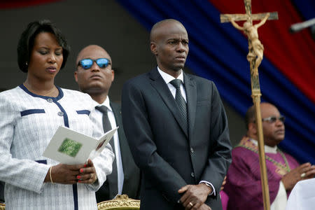 Haiti's President Jovenel Moise and First Lady Martine attend the funeral of former President Rene Preval in Port-au-Prince, Haiti, March 11, 2017. REUTERS/Andres Martinez Casares