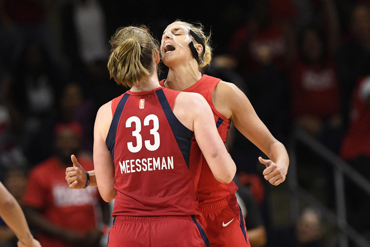 Washington Mystics center Emma Meesseman (33) and Elena Delle Donne, back reacts during the second half of Game 2 of a WNBA playoff basketball series against the Las Vegas Aces, Thursday, Sept. 19, 2019, in Washington. The Mystics won 103-91. (AP Photo/Nick Wass)