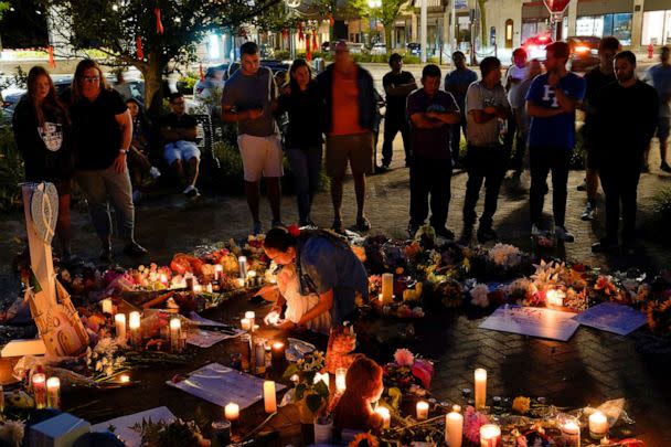 PHOTO: Mourners visit a memorial site after a mass shooting at a Fourth of July parade in the Chicago suburb of Highland Park, Ill., July 6, 2022. (Cheney Orr/Reuters, FILE)