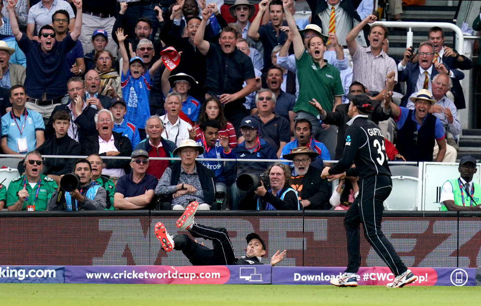 New Zealand's Trent Boult stumbles over the boundary during the ICC World Cup Final at Lord's, London.