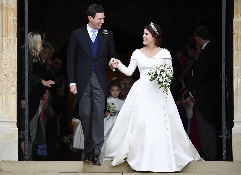 Jack Brooksbank and Princess Eugenie of York leave the wedding of Princess Eugenie of York to Jack Brooksbank at St. George's Chapel on October 12, 2018 in Windsor, England. (Photo by Toby Melville - WPA Pool/Getty Images)