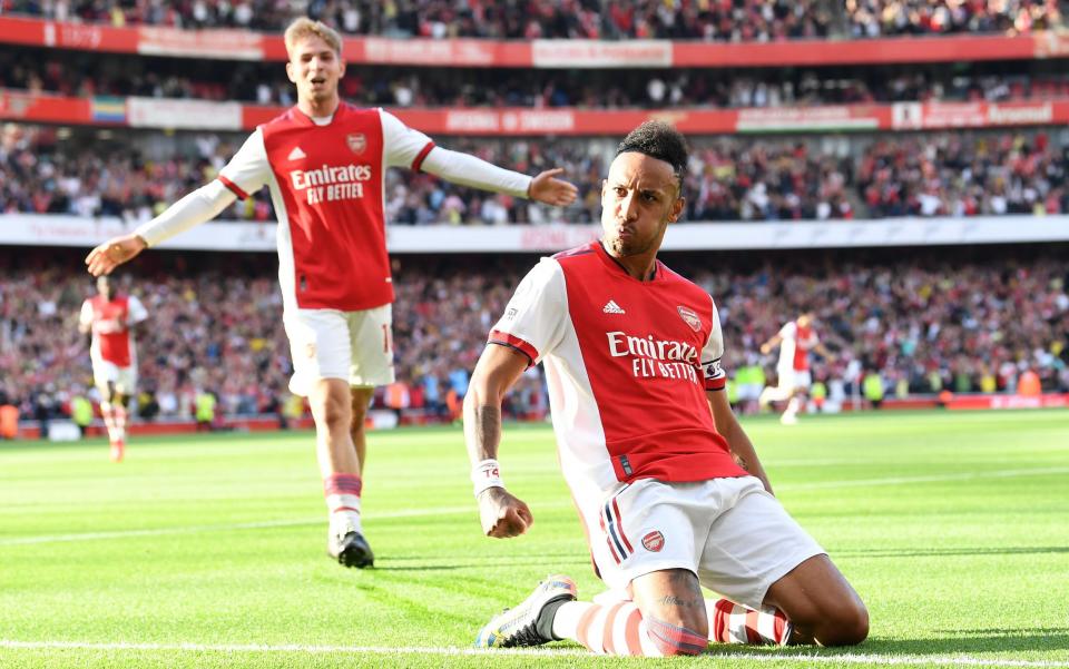 Pierre-Emerick Aubameyang celebrates scoring Arsenal's 2nd goal during the Premier League match between Arsenal and Tottenham Hotspur at Emirates Stadium on September 26, 2021 in London, England.  - GETTY IMAGES