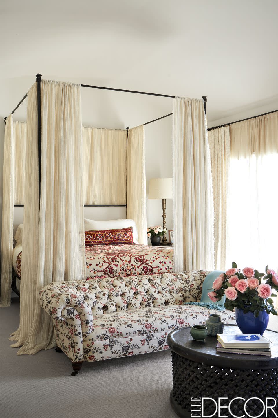 a canopied four poster bed with bed curtains created by kathryn ireland