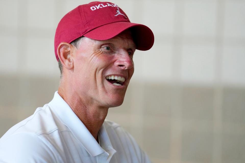 OU coach Brent Venables talks with a fan during Meet the Sooners Day for the University of Oklahoma football team at Gaylord Family-Oklahoma Memorial stadium in Norman, Okla. Saturday, Aug. 3, 2024.