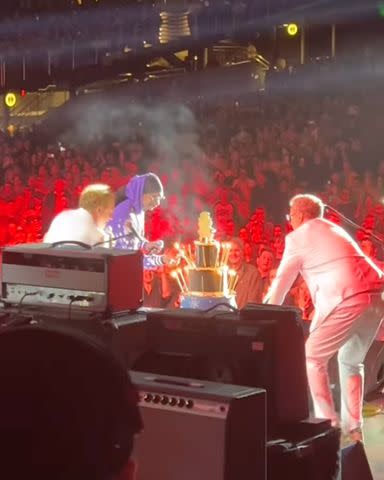 <p>Snoop Dogg/Instagram</p> Will Ferrell and John C. Reilly present Snoop Dogg with birthday cake