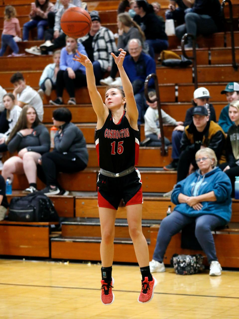 Isabella Lauvray shoots a 3-pointer during the fourth quarter of Coshocton's 40-39 loss to host River View on Monday night in Warsaw.